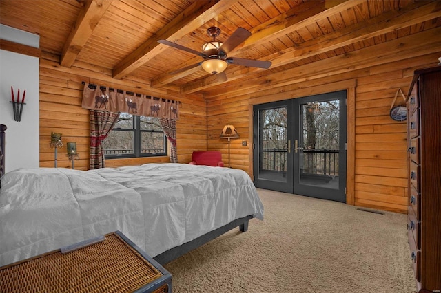 carpeted bedroom featuring access to exterior, ceiling fan, french doors, wooden ceiling, and beamed ceiling