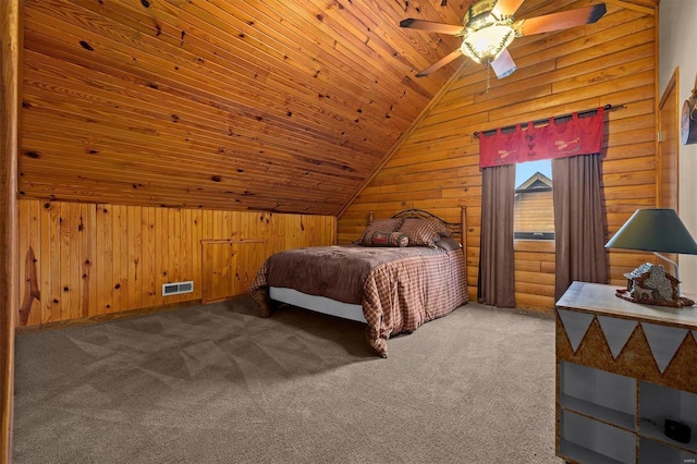 carpeted bedroom with ceiling fan, wood ceiling, wooden walls, and lofted ceiling