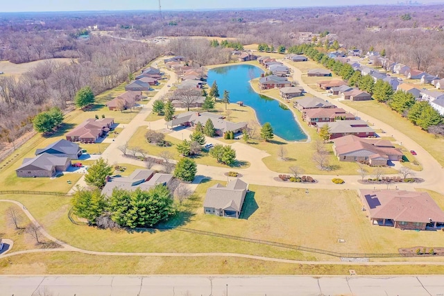 bird's eye view featuring a water view and a residential view