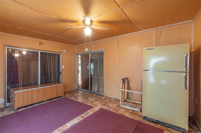 view of patio featuring ceiling fan