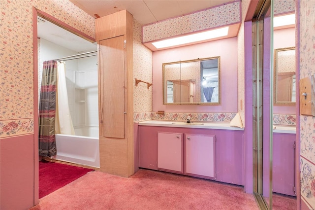 bathroom featuring vanity and shower / bath combination with curtain