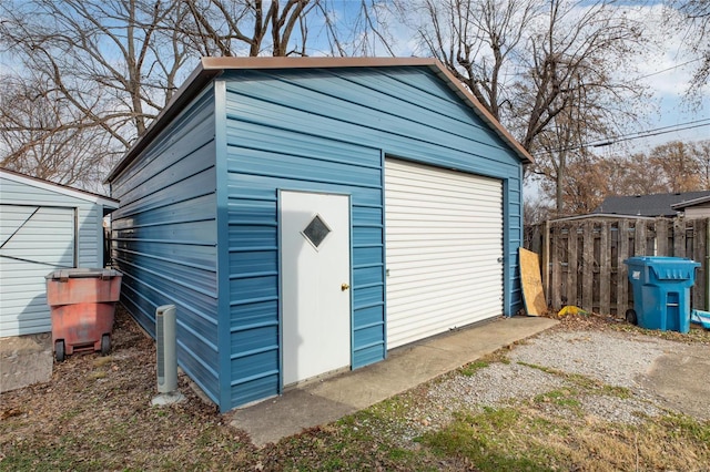 view of outbuilding featuring a garage