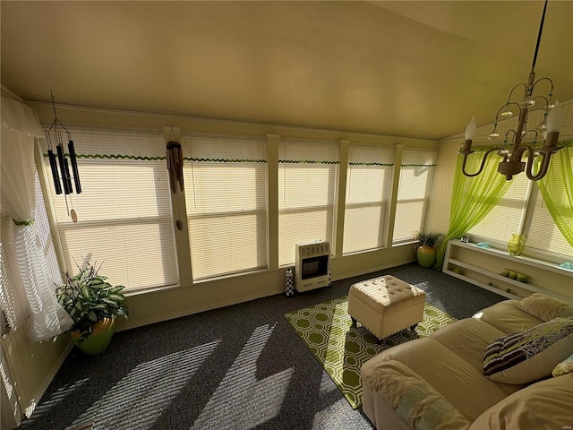 sunroom / solarium with a wealth of natural light and heating unit