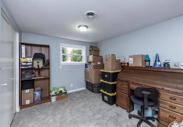 home office with light colored carpet