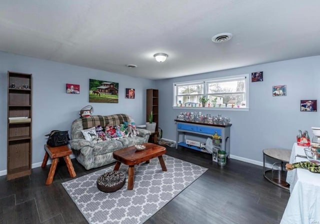 living room featuring dark hardwood / wood-style floors