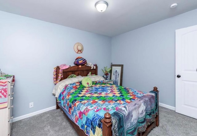 bedroom featuring carpet