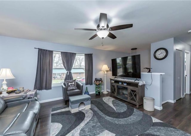 living room with dark hardwood / wood-style floors and ceiling fan