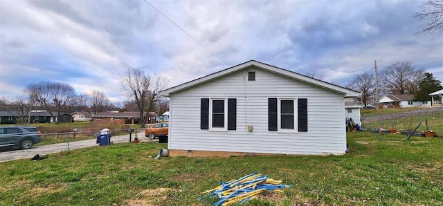 view of property exterior featuring a yard