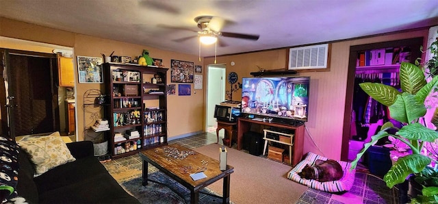 living room featuring ceiling fan