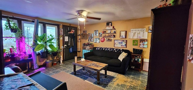 living room featuring ceiling fan