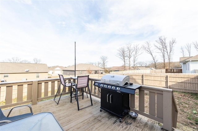 wooden terrace with grilling area