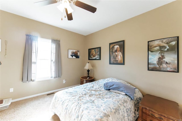 bedroom with ceiling fan and carpet floors