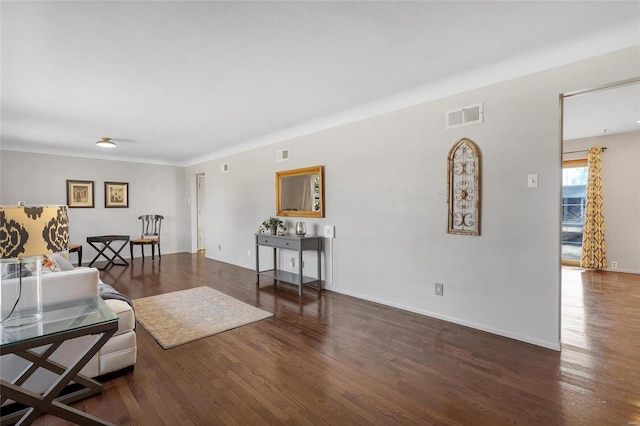 living room with dark hardwood / wood-style floors