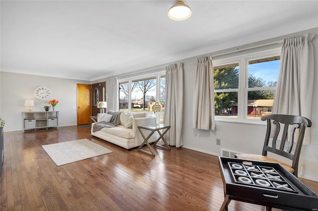 living room with dark hardwood / wood-style floors