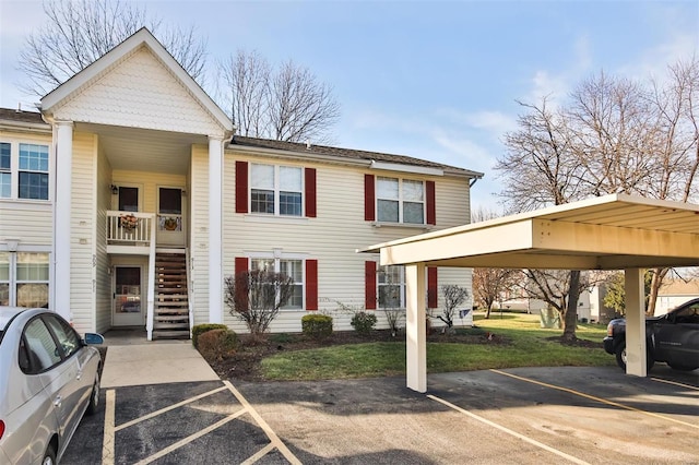 view of property featuring a carport