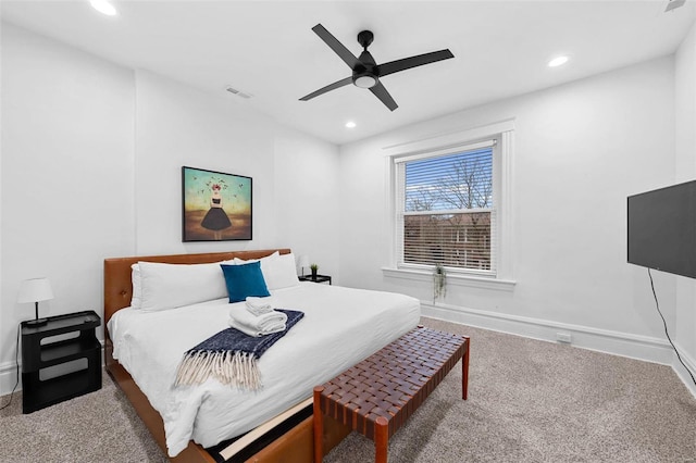 carpeted bedroom with ceiling fan