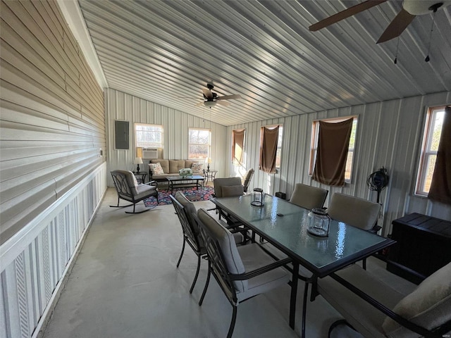 dining space with ceiling fan, cooling unit, lofted ceiling, and a wealth of natural light