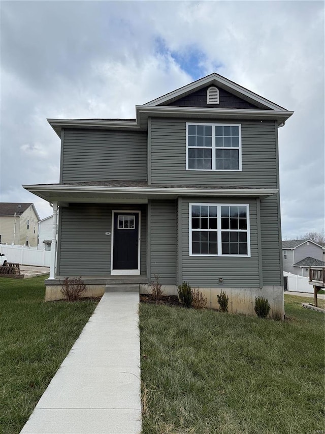 view of front of house with a front lawn