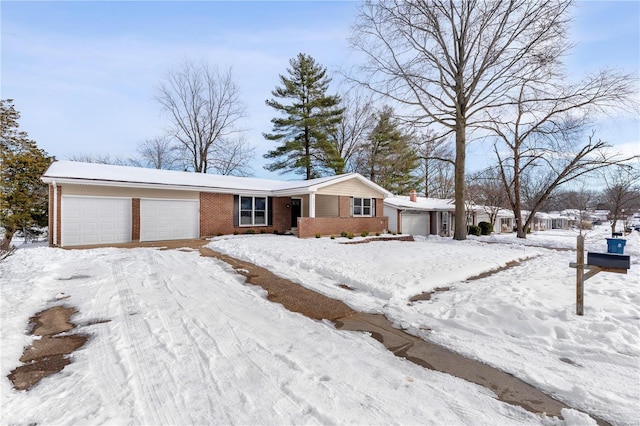 single story home featuring a garage