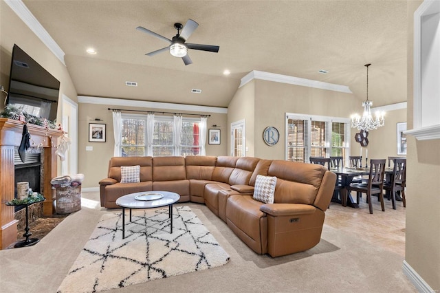 carpeted living room with a healthy amount of sunlight, ornamental molding, and lofted ceiling