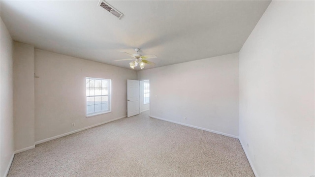 unfurnished room with ceiling fan