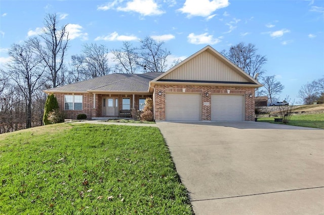 view of front of home featuring a garage and a front yard