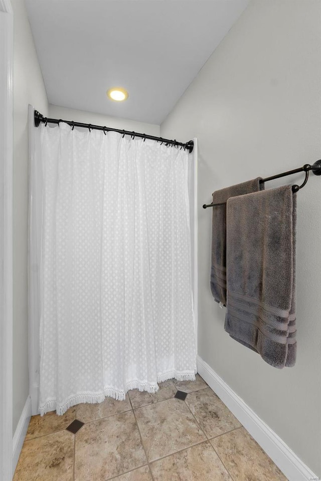 bathroom featuring tile patterned flooring