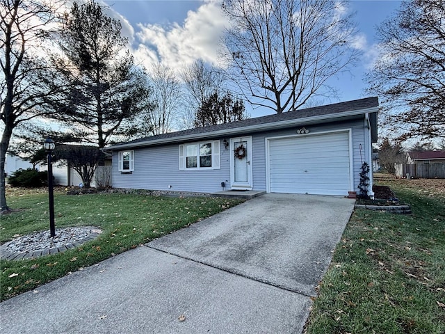 single story home with a garage and a front yard