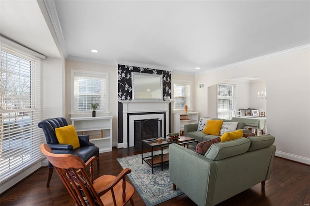 living room featuring crown molding and dark hardwood / wood-style floors