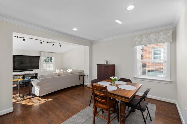 dining space featuring ornamental molding and dark wood-type flooring