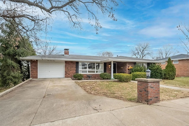 single story home featuring a garage and a front lawn