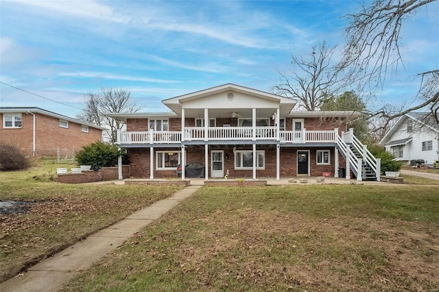 view of front of house featuring a deck and a front yard