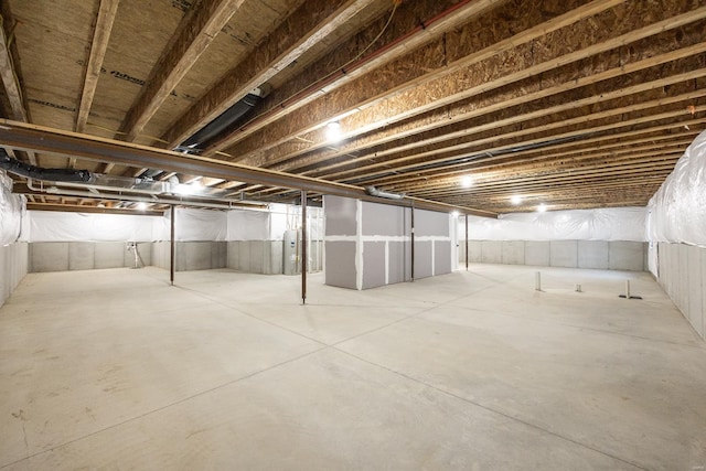 basement featuring electric water heater