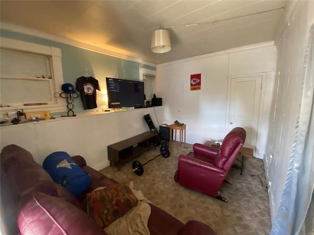 living area with carpet flooring and crown molding