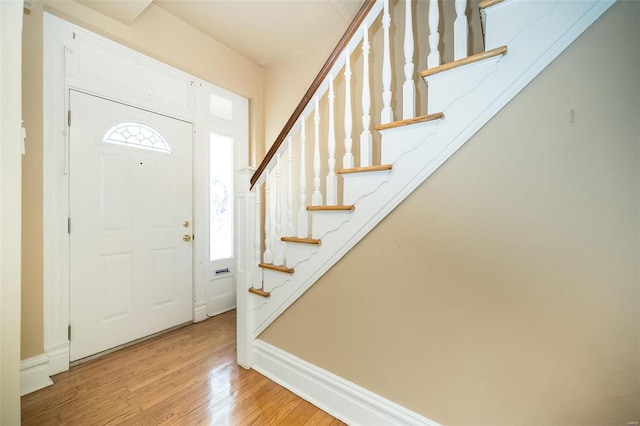 foyer with light hardwood / wood-style floors