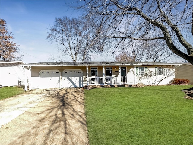 ranch-style home with a front yard, a porch, and a garage