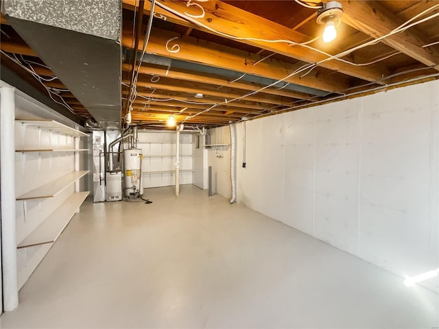 basement featuring heating unit and gas water heater