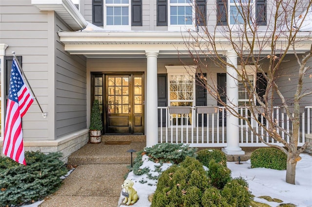 property entrance featuring a porch