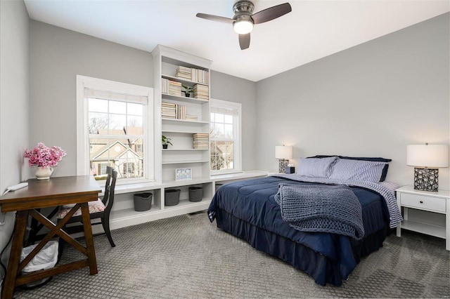 carpeted bedroom with ceiling fan