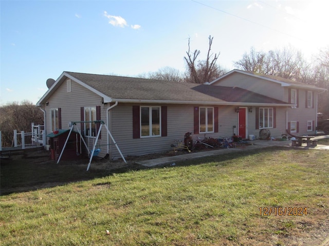 view of front of home with a front yard