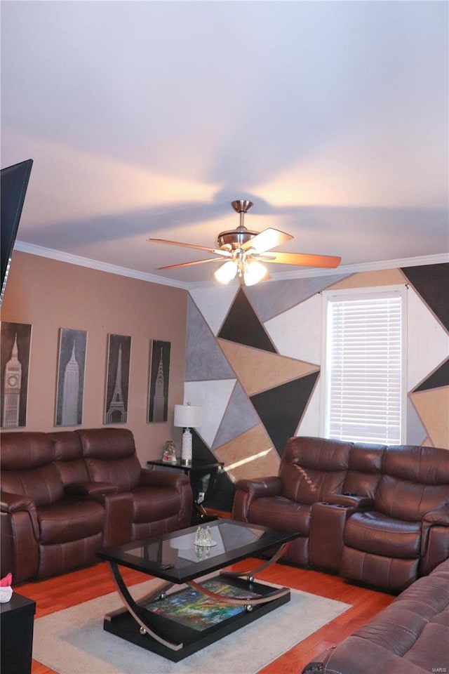 living room with crown molding, light hardwood / wood-style flooring, and ceiling fan