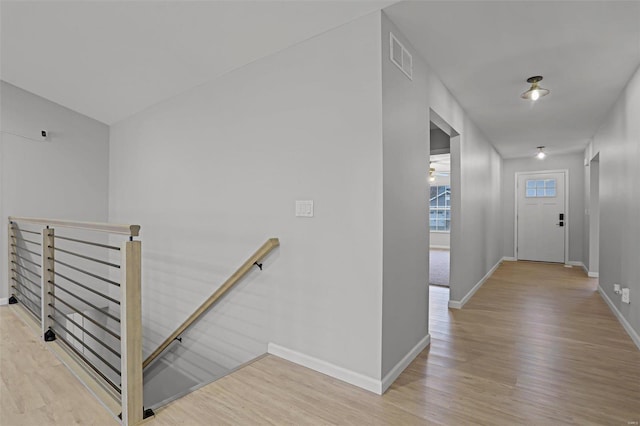 hallway featuring light hardwood / wood-style flooring