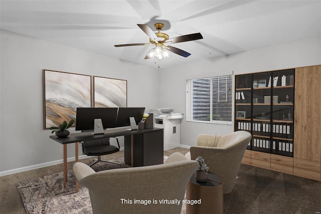 home office featuring carpet flooring and ceiling fan