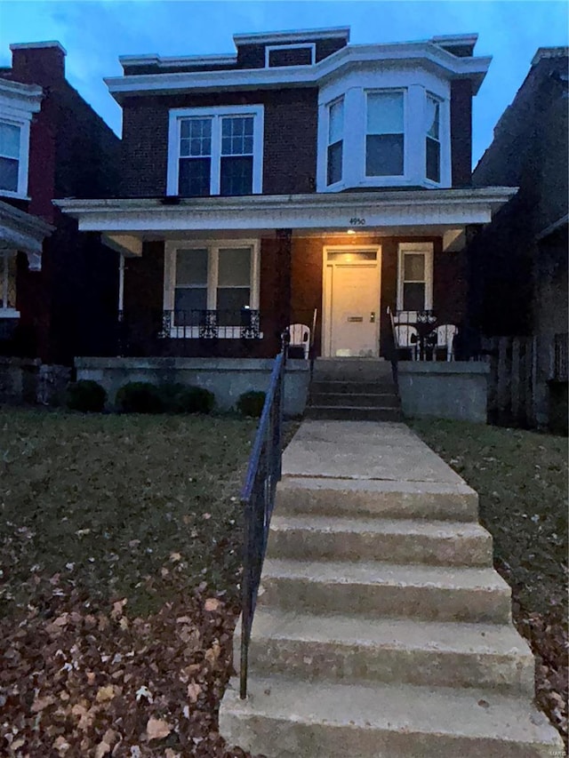 view of front of home with covered porch