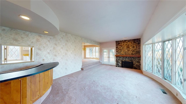 bar featuring a fireplace and carpet