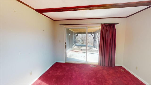 carpeted spare room with crown molding