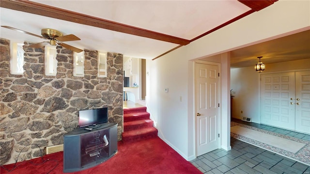 living room with ceiling fan