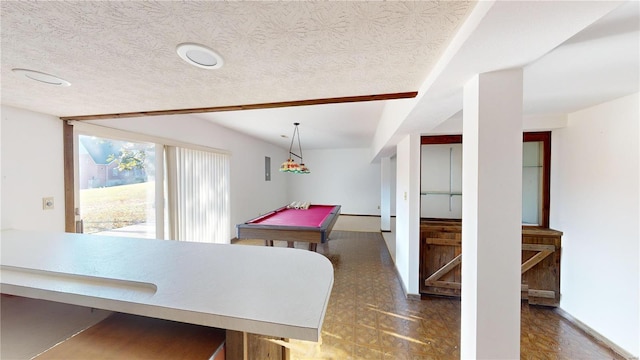 playroom featuring a textured ceiling and pool table