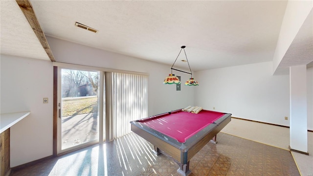 recreation room with carpet, a textured ceiling, and pool table