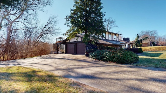 view of property exterior featuring a lawn